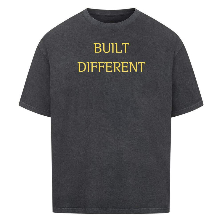 Oversized Saiyan Genetics Built Different shirt in black with bold logo print, made of 100% cotton for fitness and casual wear