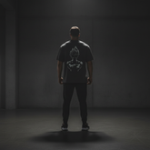 Genetic Tee Charcoal Hinten
